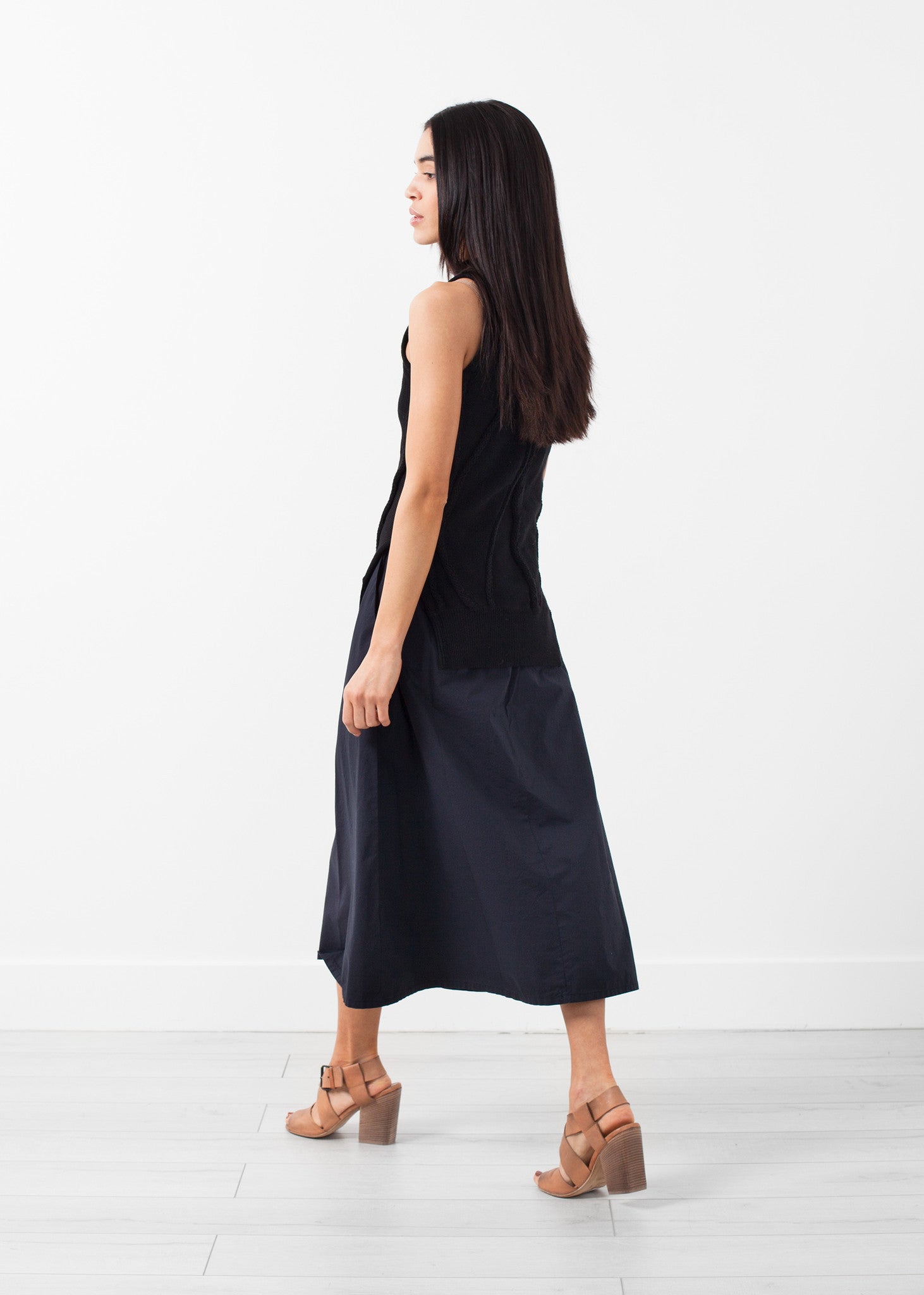 Ívelt csíkos kötött trikó