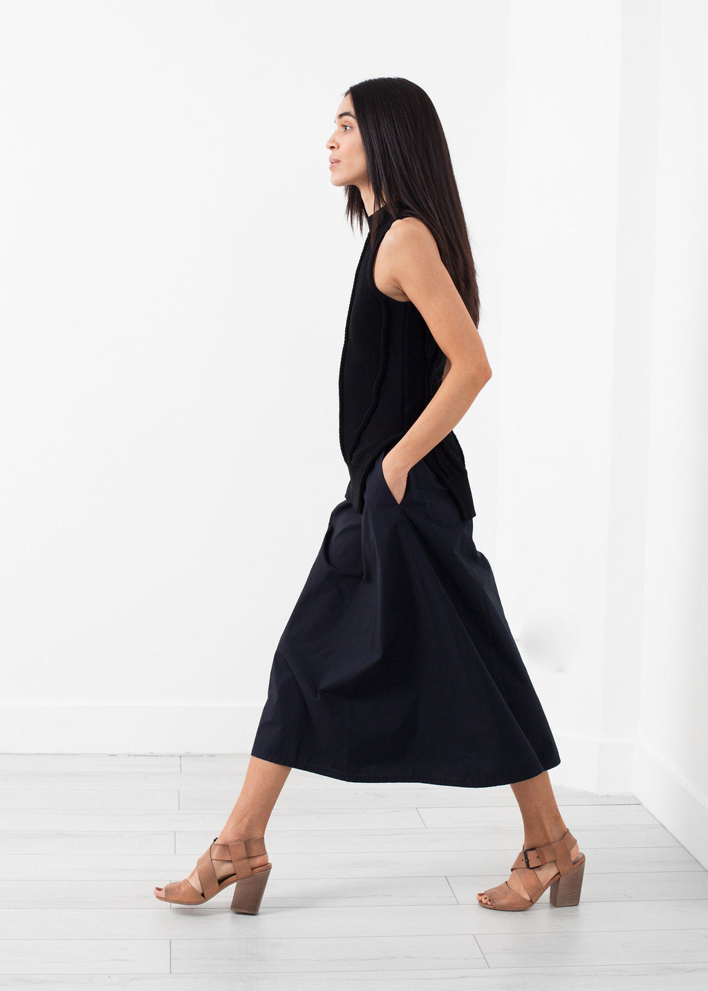 Ívelt csíkos kötött trikó