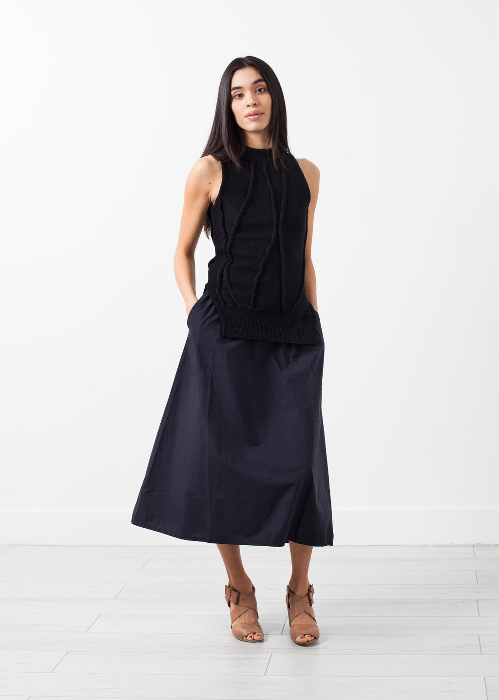 Ívelt csíkos kötött trikó