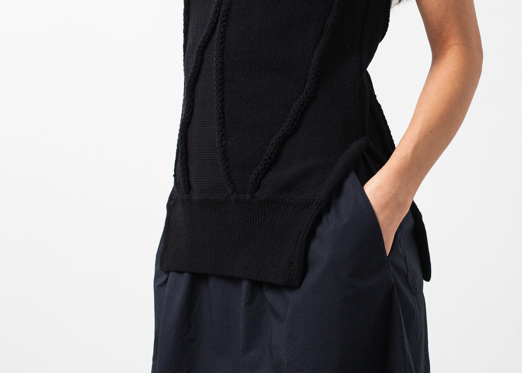 Ívelt csíkos kötött trikó