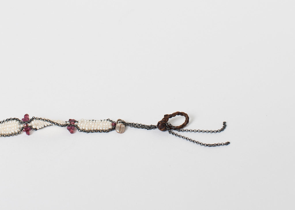 Gránát karkötő habos gyöngyből