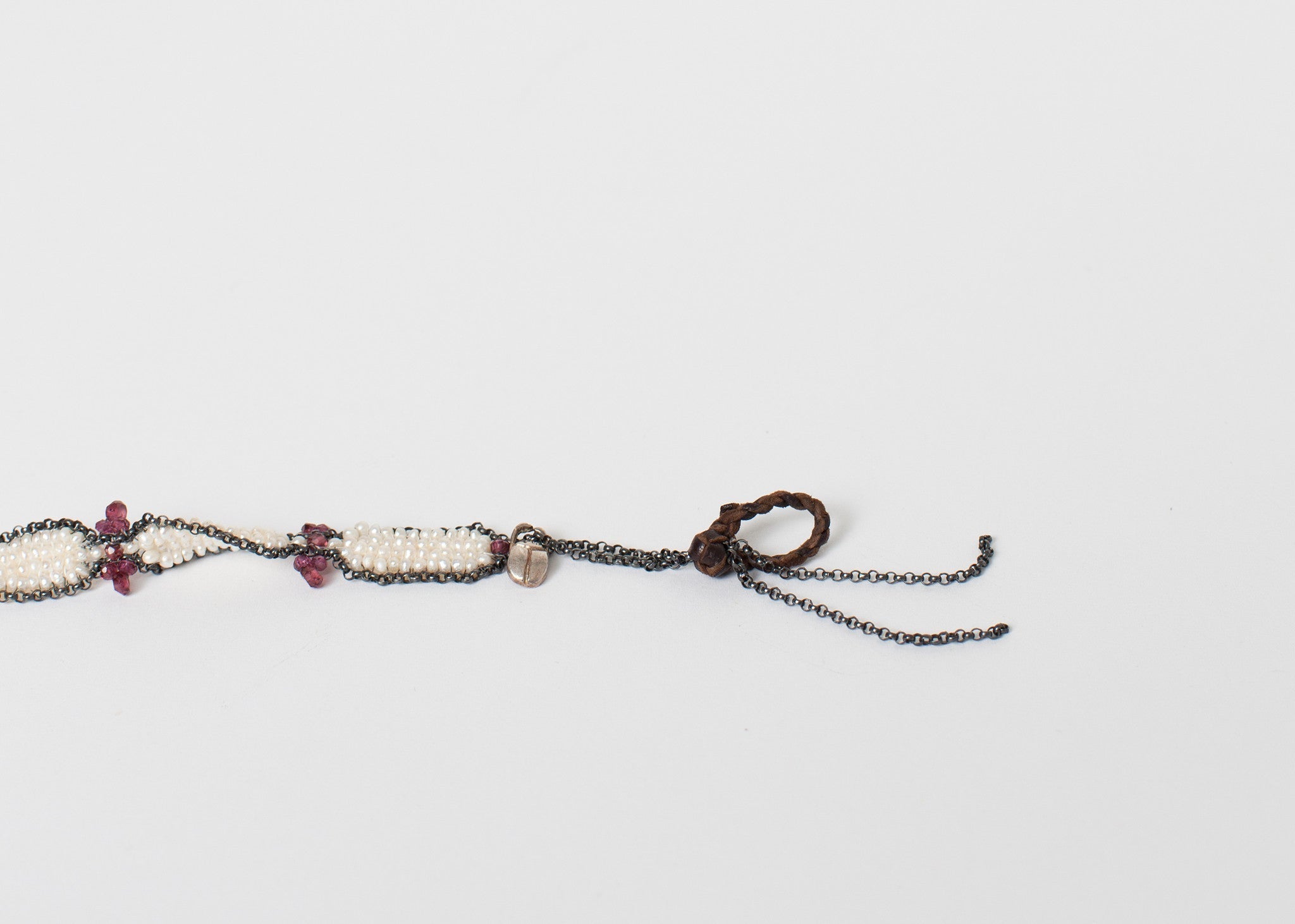 Gránát karkötő habos gyöngyből